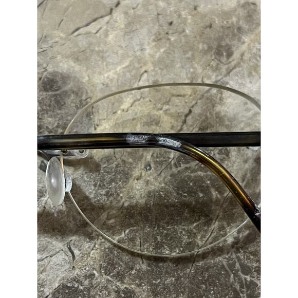 Marchon Airlock 2 - 770/39 RIMLESS EYEGLASSES 47-21-135 color 015 Tortoise - Picture 4 of 11